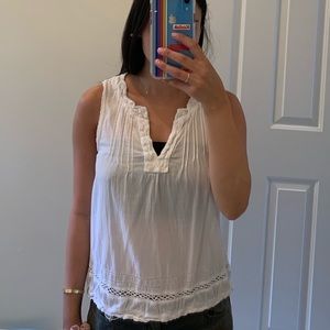 White blouse with lace detailing and v neck